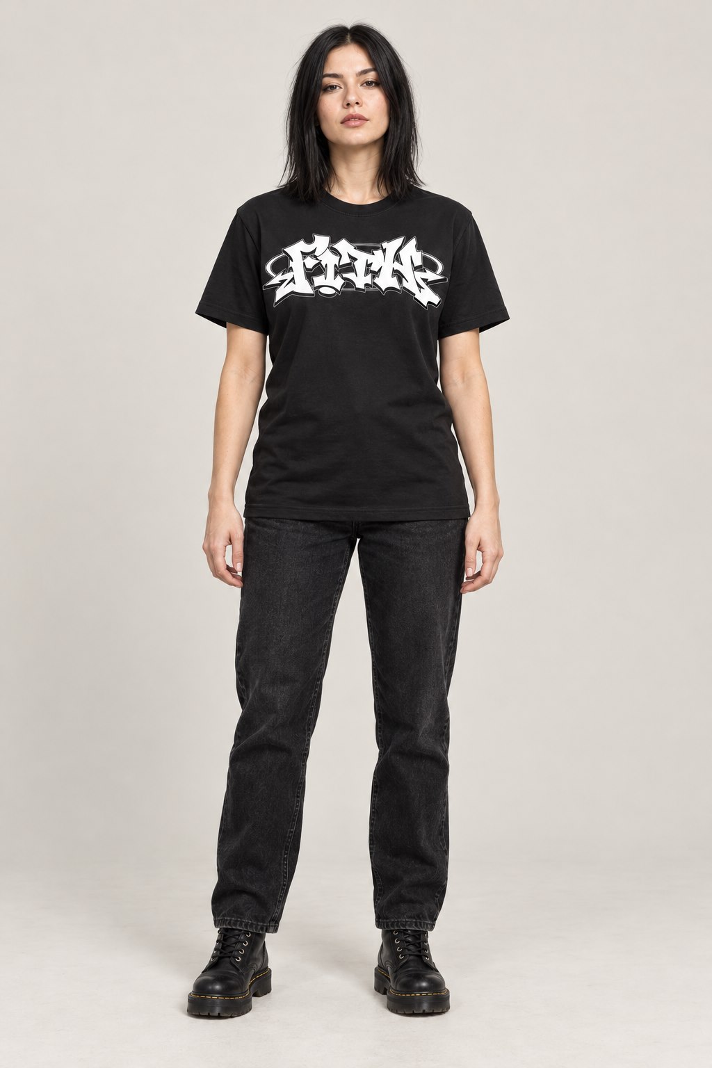 Adult female model wearing the F!TH Spray Paint Tag Tee